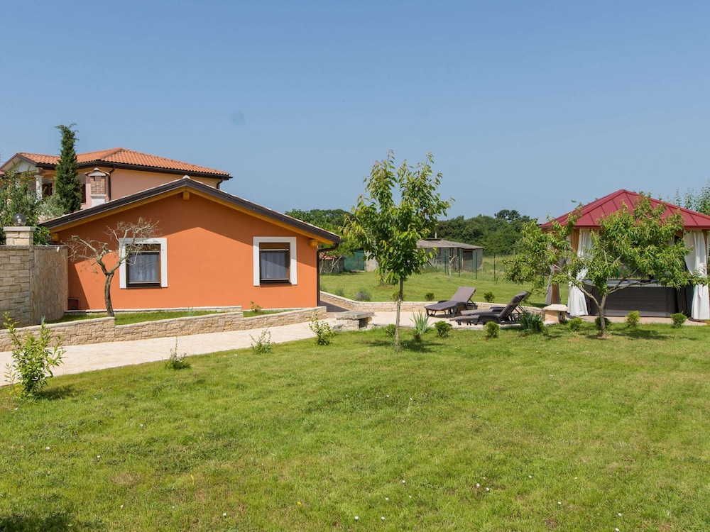 Attractive Holiday Home with Pool, Hot Tub, Patio, Courtyard view 4
