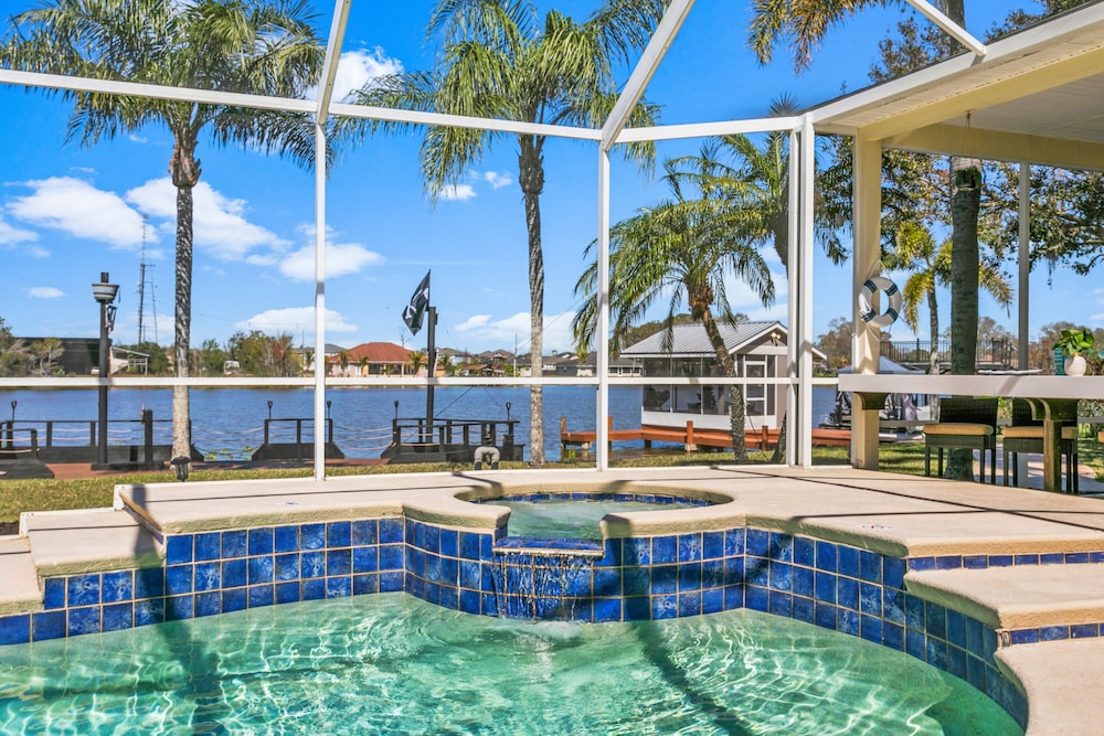 Luxe Waterfront Hideaway w Pool & Pirate Ship Dock
