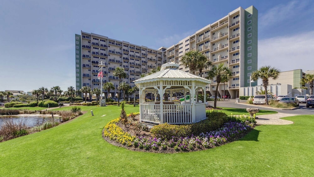 Beachfront Charm Meets Lake Life + Free Tickets: Dolphin Cruise & More!