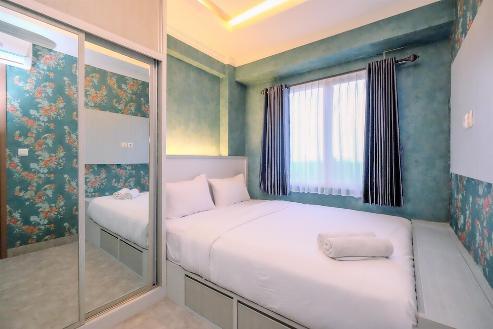 Warm and Comfortable Designed 2BR at Podomoro Golf View Apartment