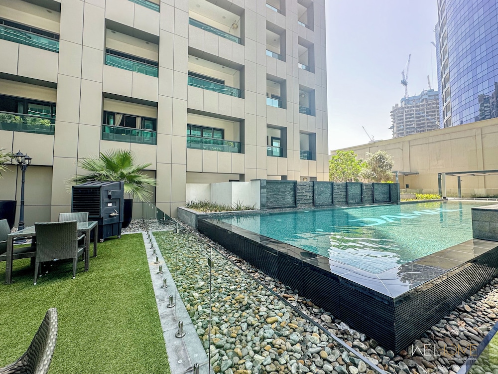 WelHome - Luxury Living in Business Bay 2BR + Maid's Room