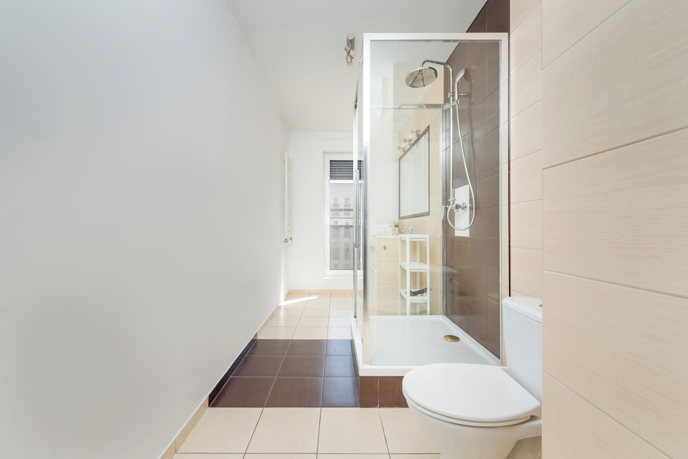 Wroclaw Dark Blue Apartment by Renters