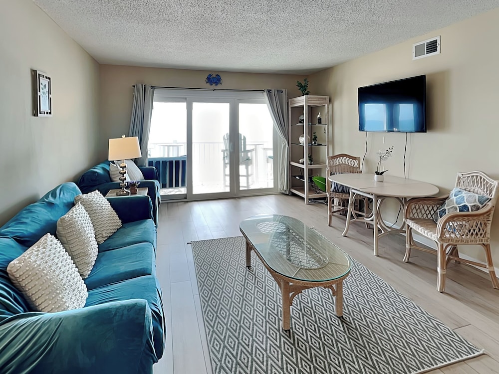 A Wave From It All by Topsail Realty