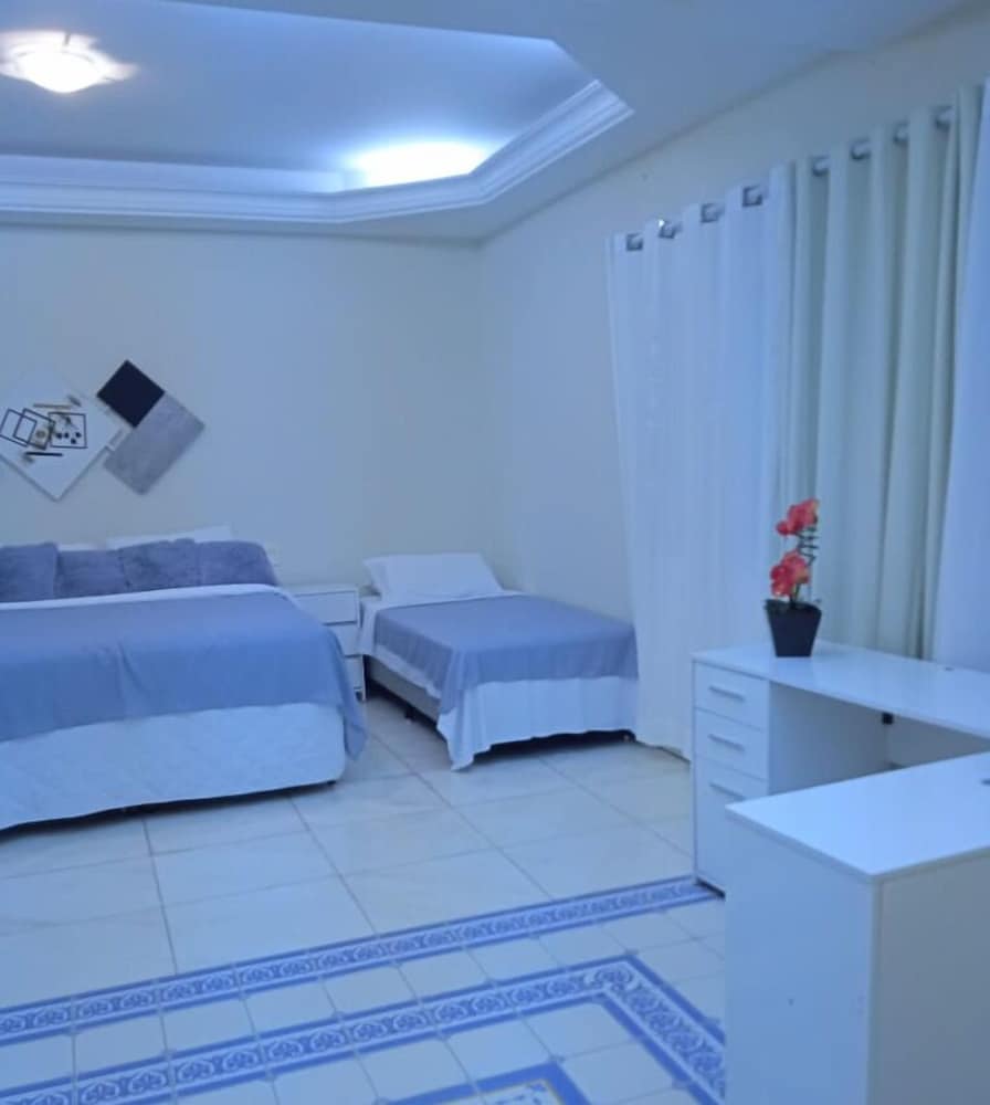 Acomodações Anfitriã