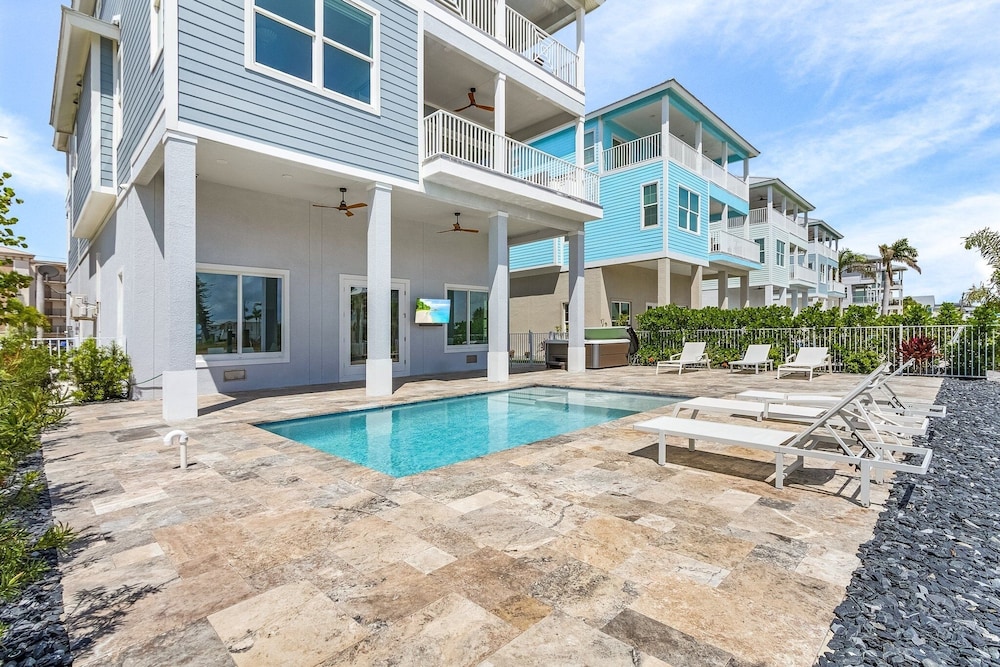 673 White Sands Retreat: Bay Views, Pool, Elevator 5 Bedroom Home