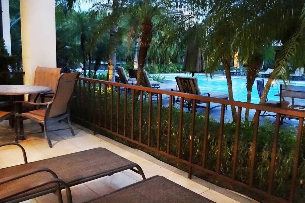 Ground-floor unit in front of lazy river pool at Pacifico in Coco
