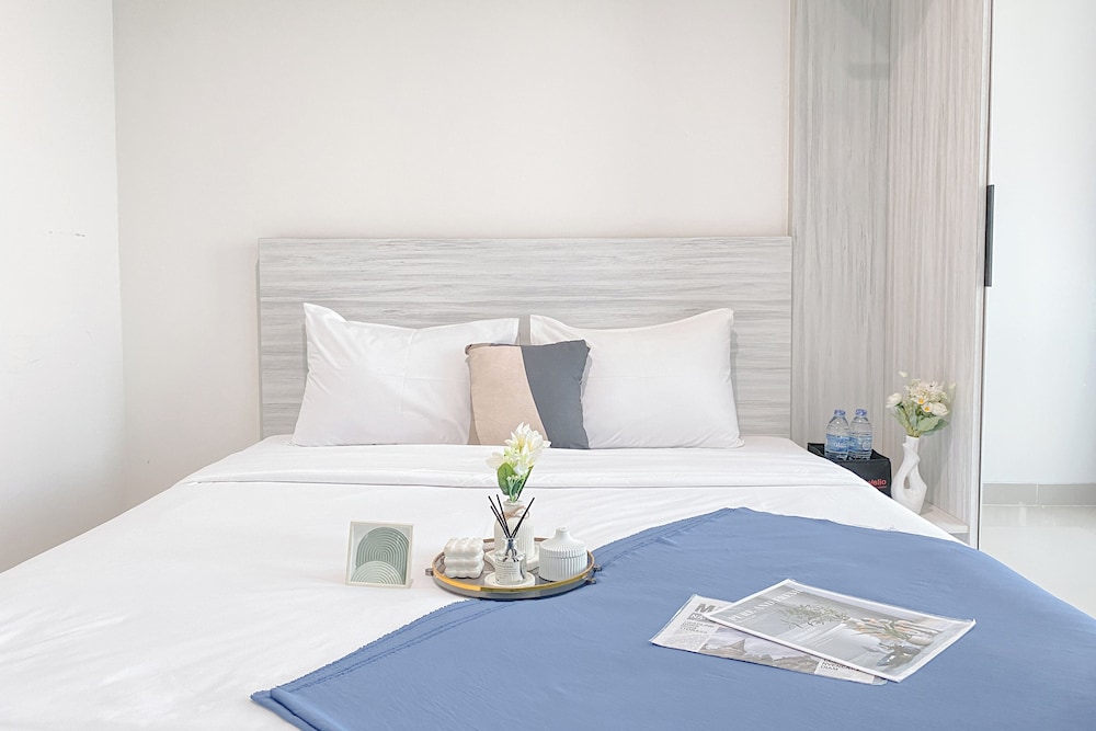 Simple White Designed Studio At Lrt City Bekasi Apartment