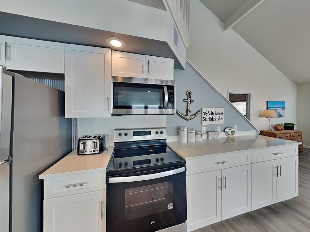 Beachfront Dolphin by Ryson Vacation Rentals
