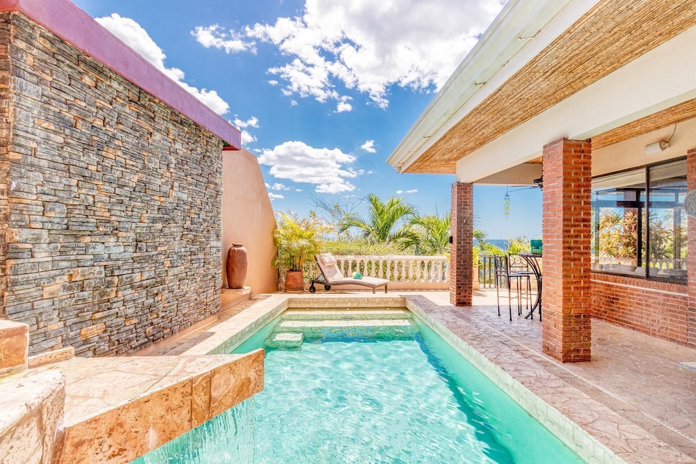 Luxury Flamingo villa with outdoor bar - pool and magnificent views view 3