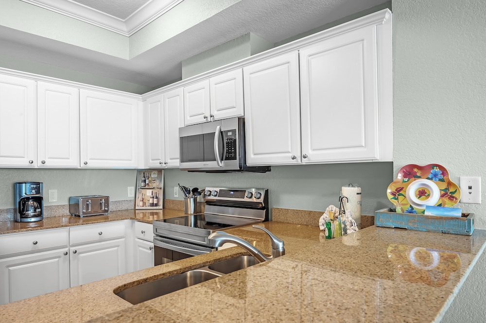 Crystal Shores West Condos by Hosteeva