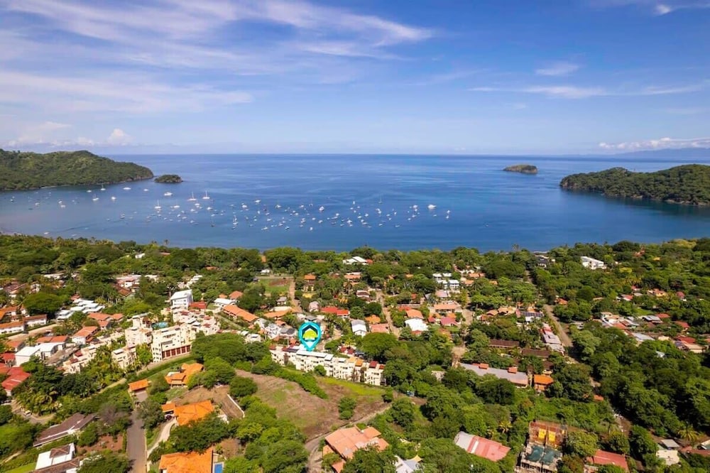 Modern Split-Level 2-Bedroom Condo with Pools, Terrace & Easy Beach Access