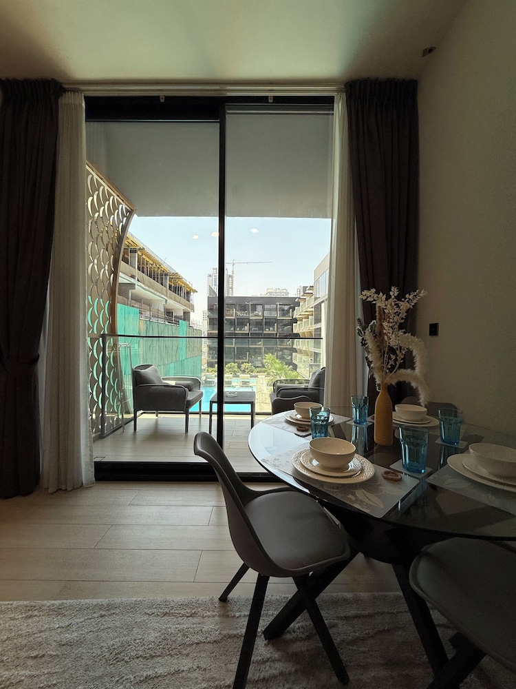 Manzil-1BR in JVC with Pool View