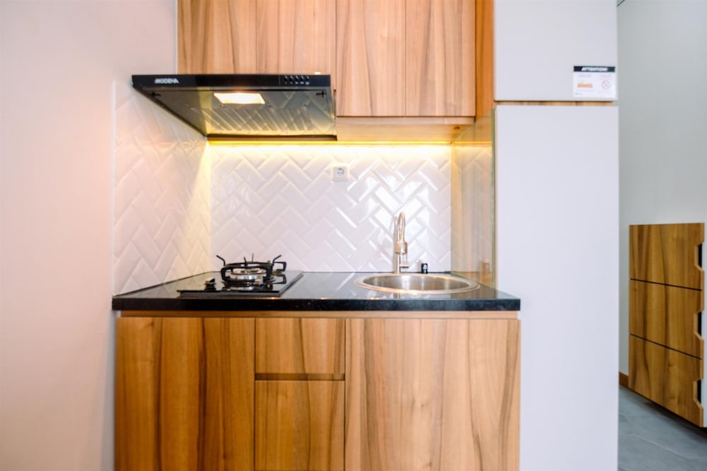 Best Homey and Comfort 2BR at Podomoro Golf View Apartment