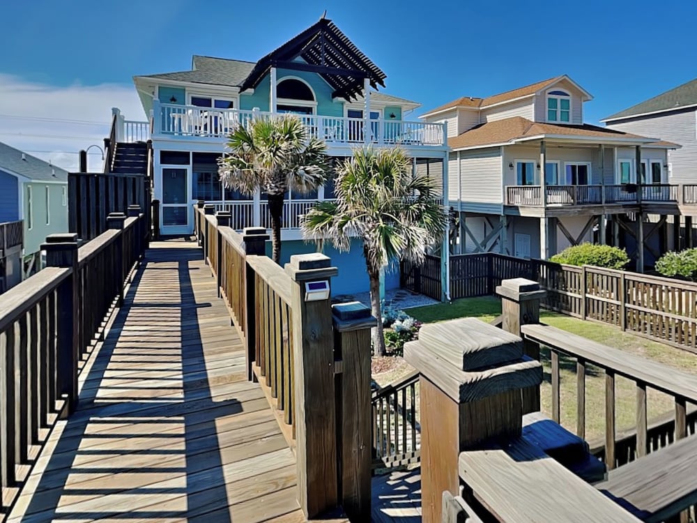 Blue Me A Wave by Topsail Realty