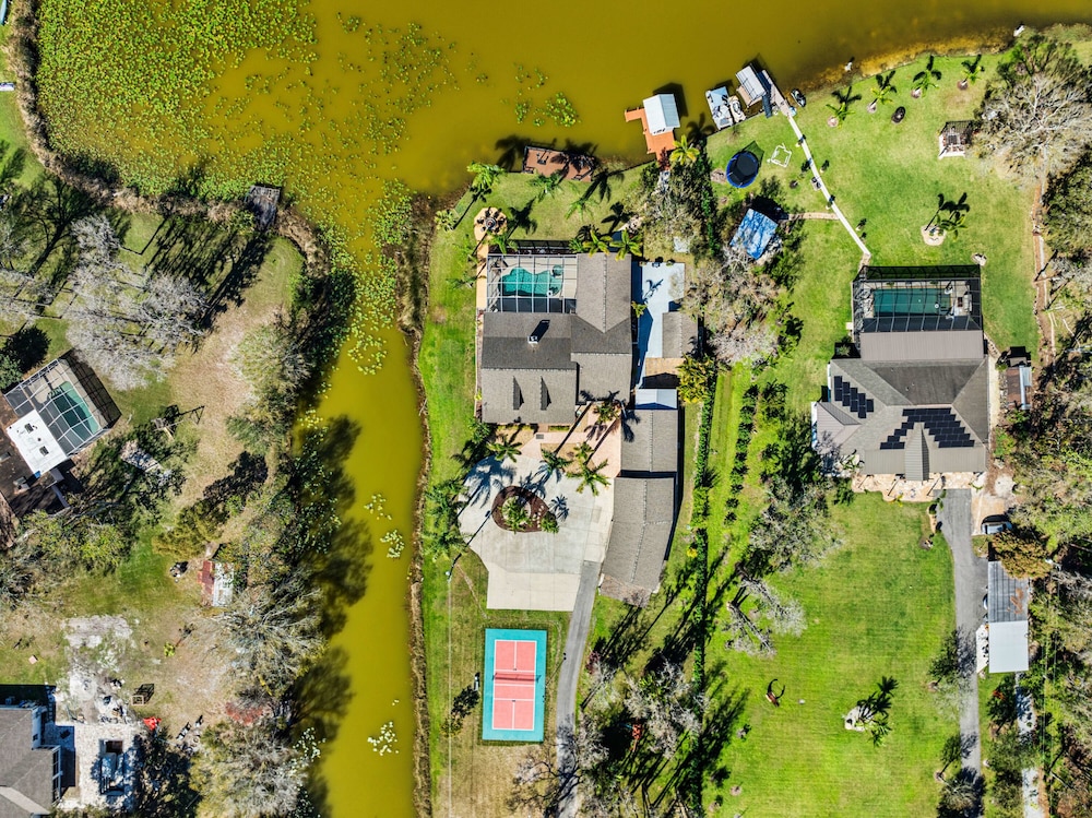 Luxe Waterfront Hideaway w Pool & Pirate Ship Dock