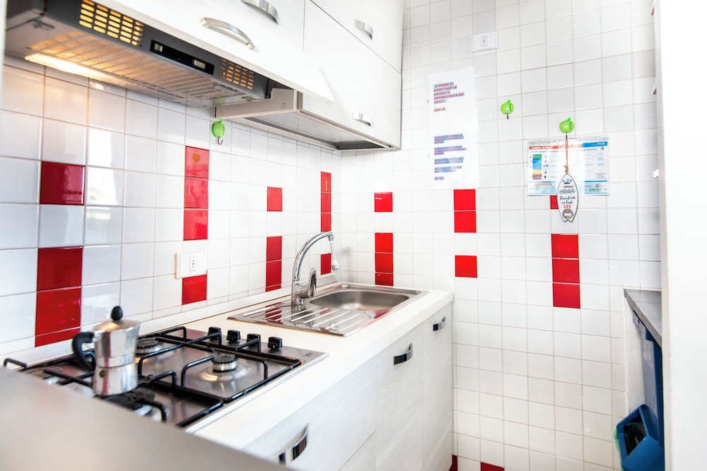 Home Le Querce en Olbia — kitchen