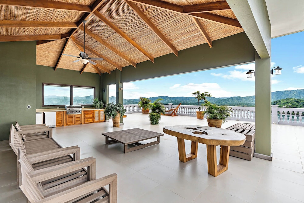 Luxury Condo with Panoramic Ocean Views, Sparkling Infinity Pool, and Modern Open-Concept Design