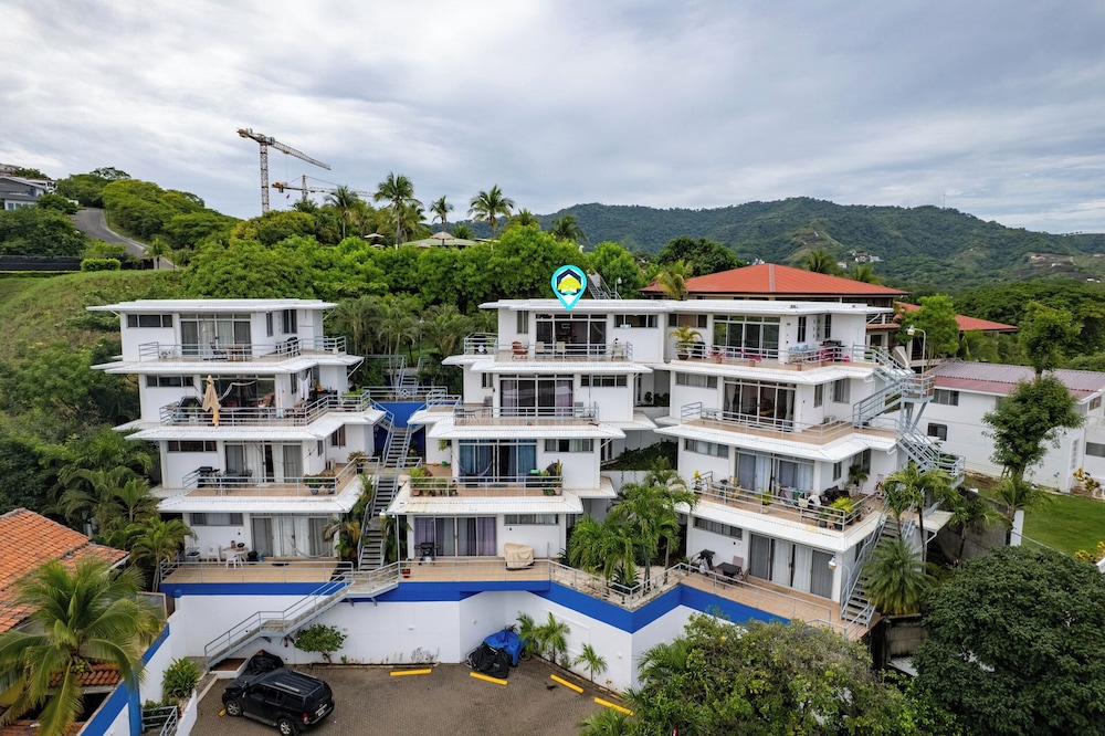 Modern Top-Floor Condo with Panoramic Views and Community Pool