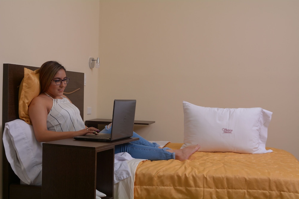 Victoria Suites Hostal