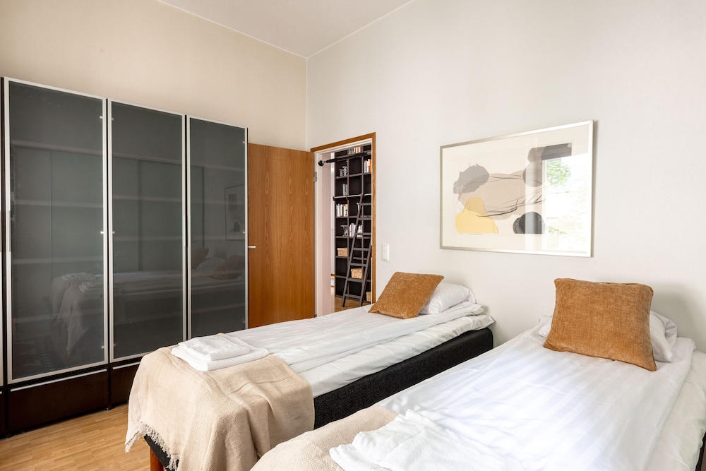 2ndhomes Deluxe 2BR Apt w Sauna&Balcony view 5