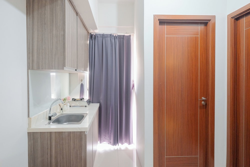 Warm and Spacious 2BR Apartment at Vittoria Residence