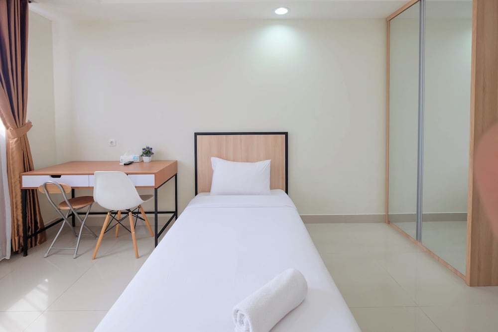 Warm And Cozy Studio At Evenciio Margonda Apartment