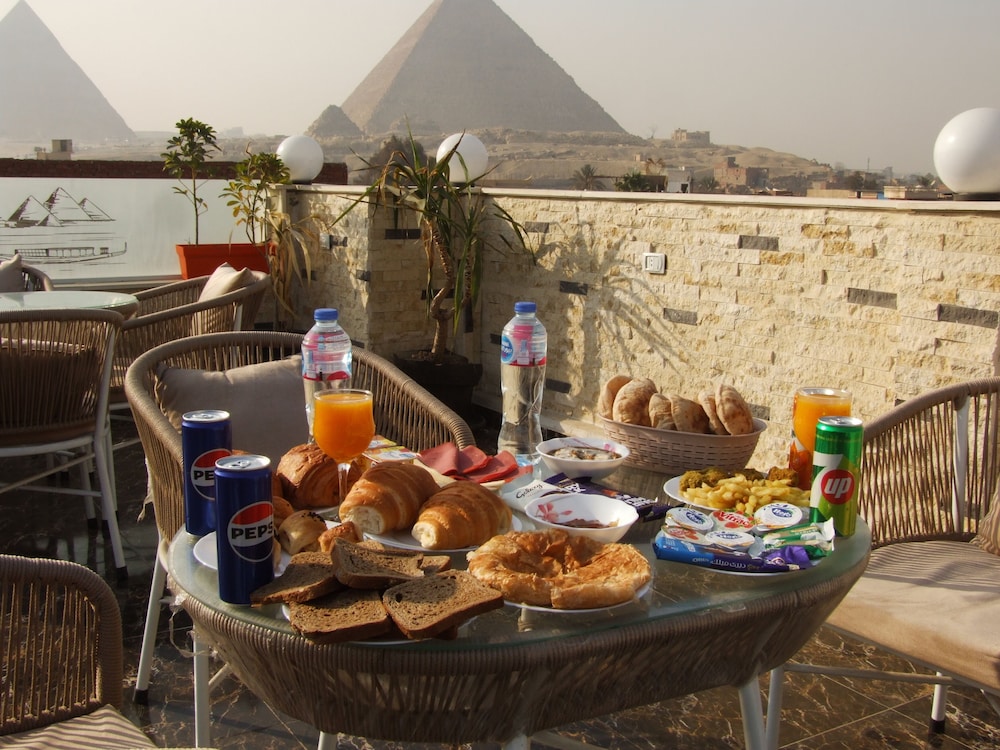 Pyramids Solar Boat Inn