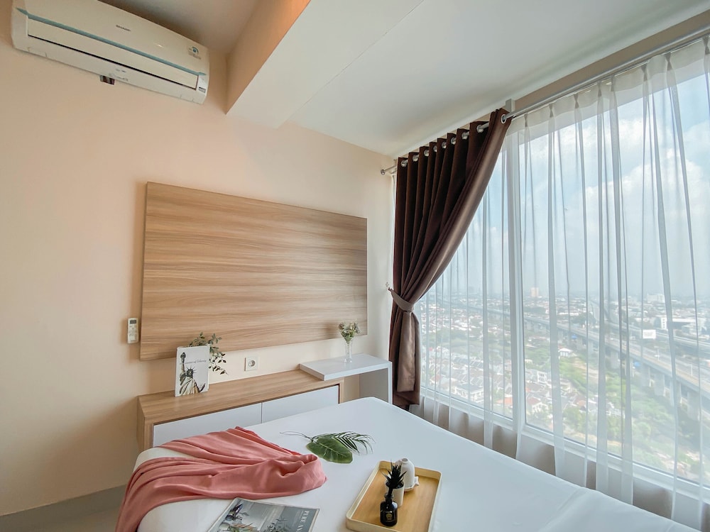 Simple And Homey 2Br At Grand Kamala Lagoon Apartment