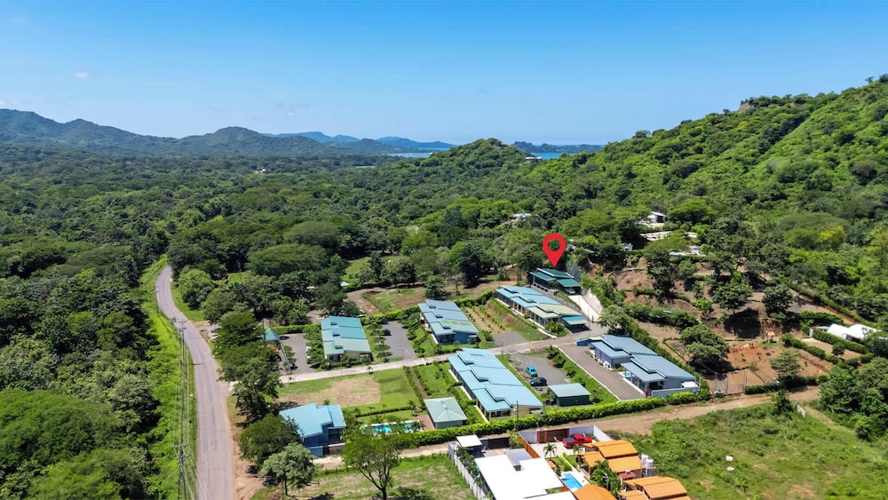 Modern Home with Lush Mountain Views and Spectacular Shaded Terrace in Private Gated Community