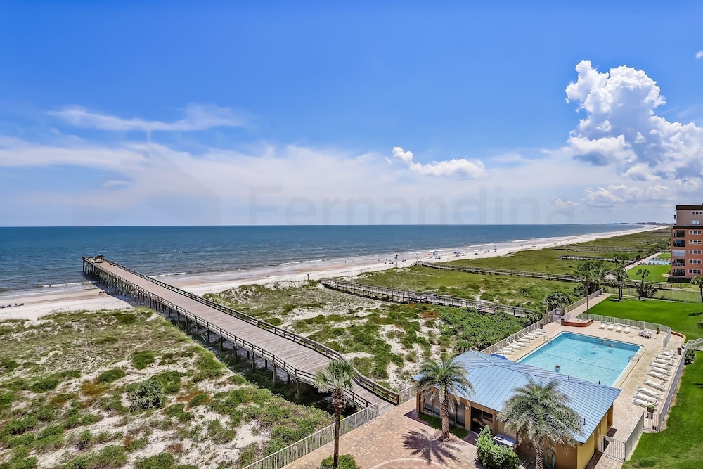 Direct Oceanfront Condo with Private Balcony by RedAwning