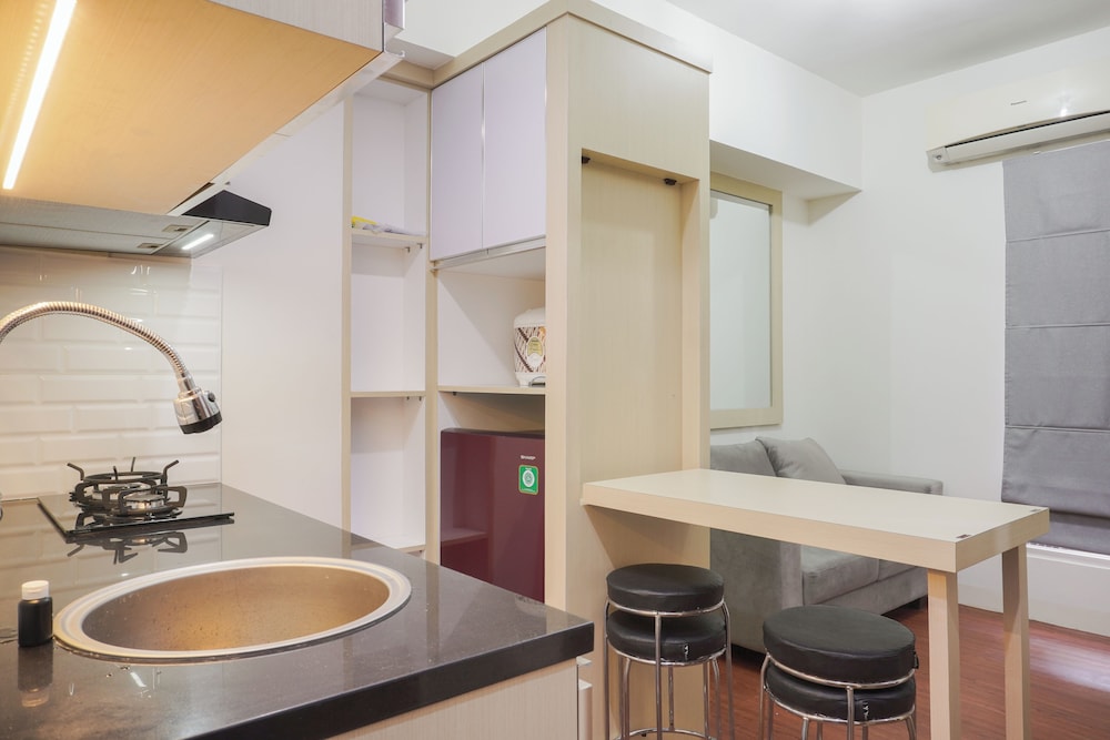 Pleasurable 2BR at Podomoro Golf View Apartment near Tol Cimanggis