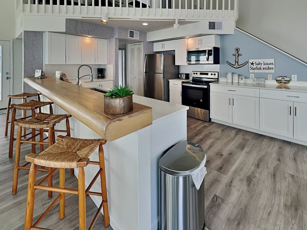 Beachfront Dolphin by Ryson Vacation Rentals
