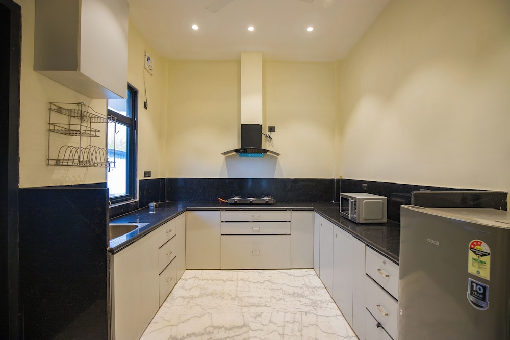 ELIVAAS Ibiza Luxe 4-BHK Farmhouse