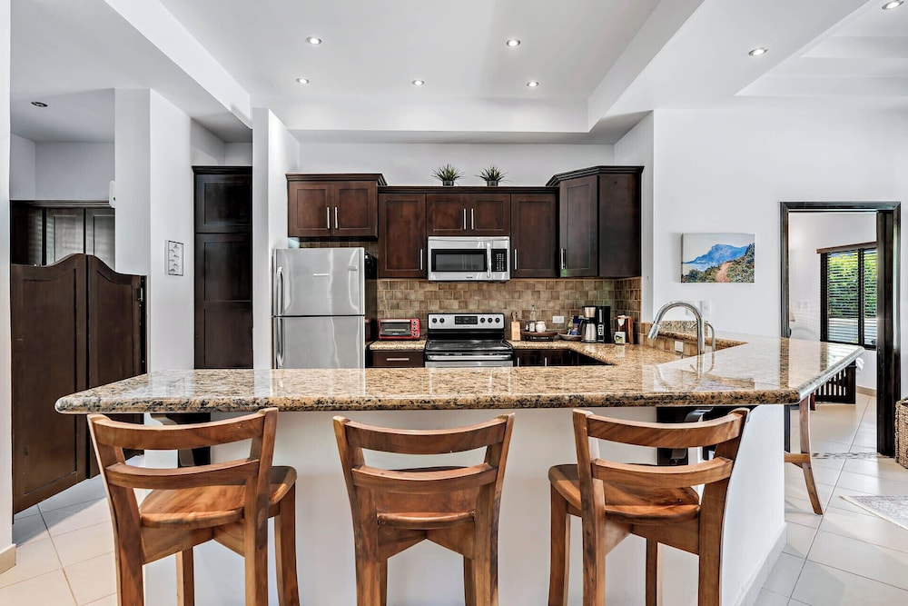 Stylish Home with Chic Decor, Luxury Amenities & Tropical Outdoor Oasis with Sparkling Private Pool