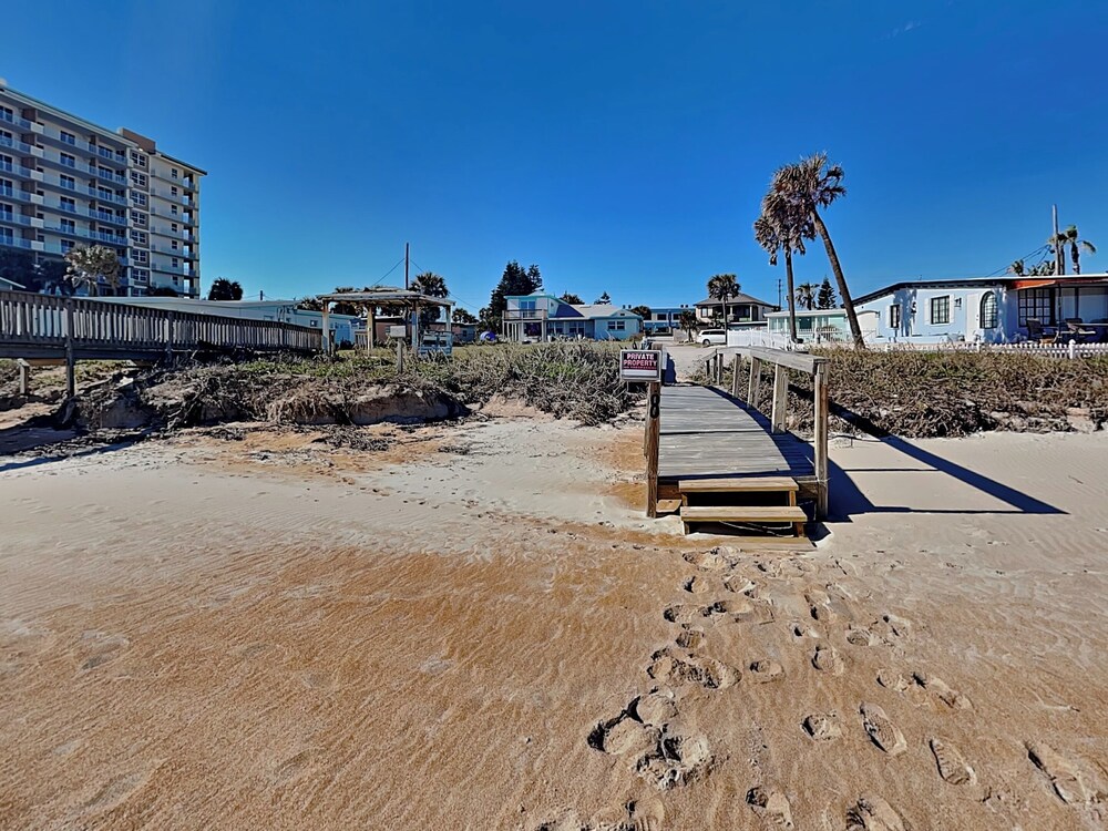 Bathing Suit Beach Bungalow by Distinctive Beach Rentals