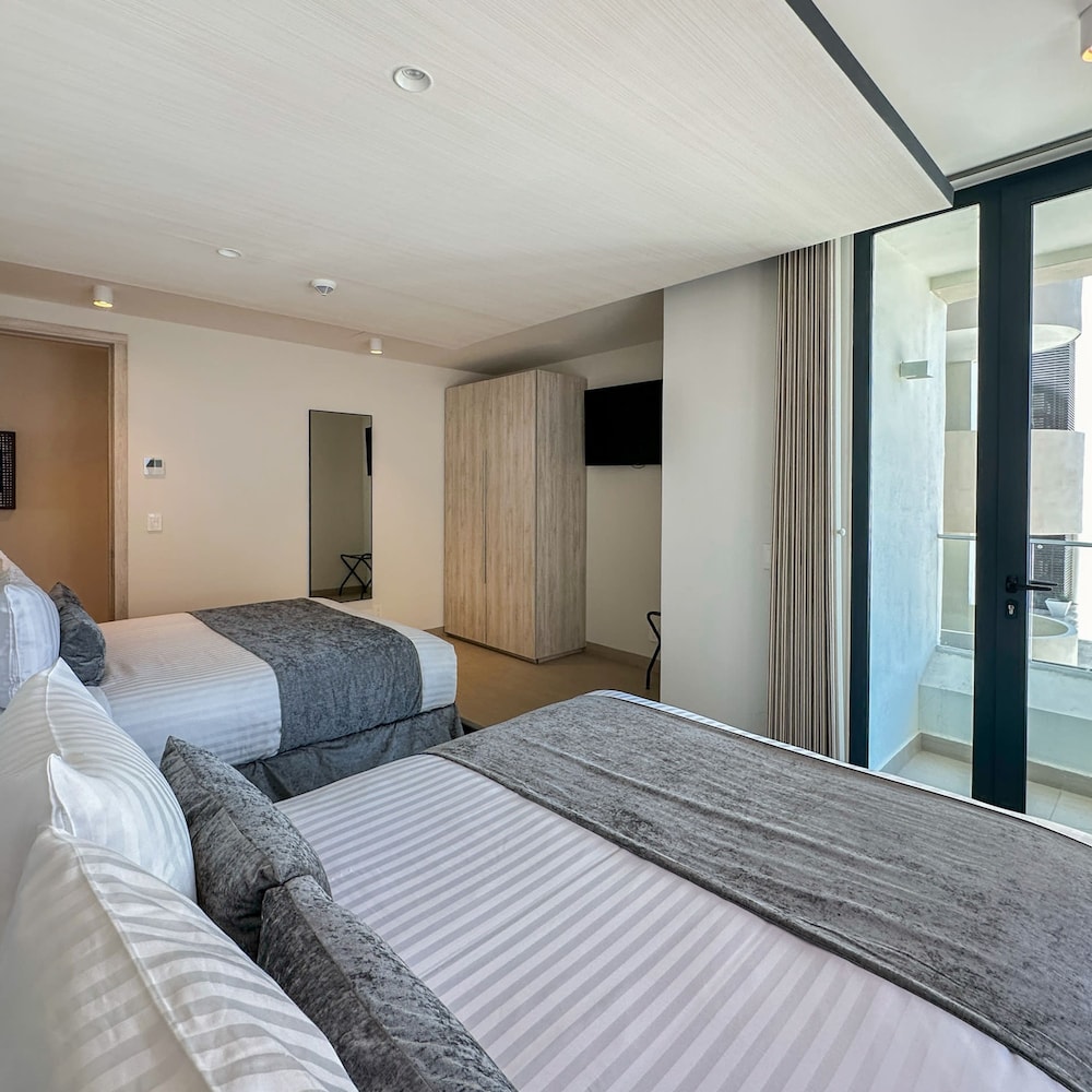 Brand-new Modern 2BR Gem on Iconic Sandy Beach