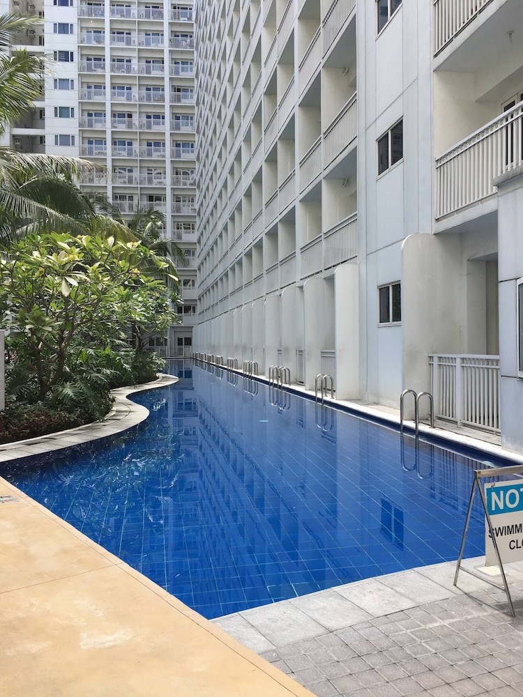 Relax in Pasay City's Best Kept Secret - Spacious Condo With Garden View