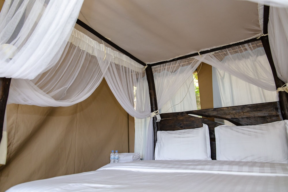 Room in Lodge - Find a Quiet Beach Resort at Rushel Kivu Resort!