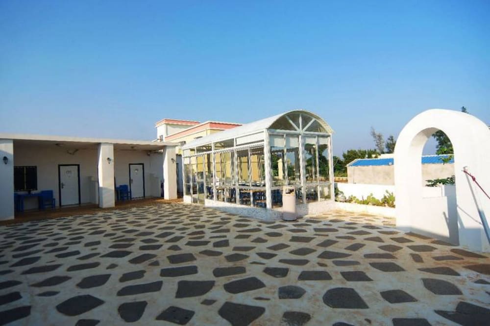 Weizhou Island Shengxiaguangnian Inn