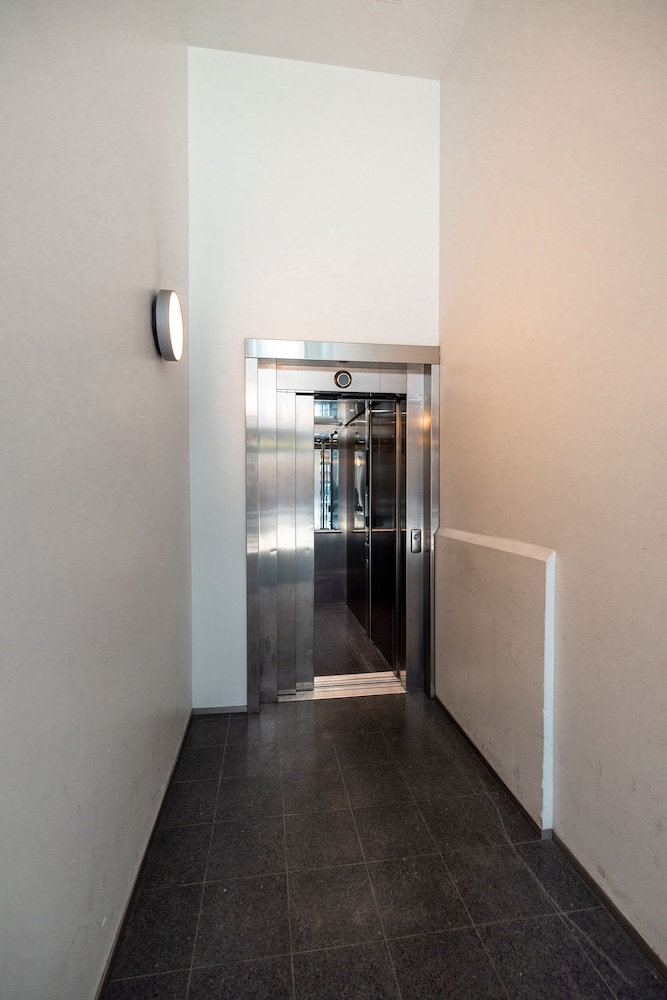 2ndhomes Stylish 1BR Apt w Sauna&Balcony view 2