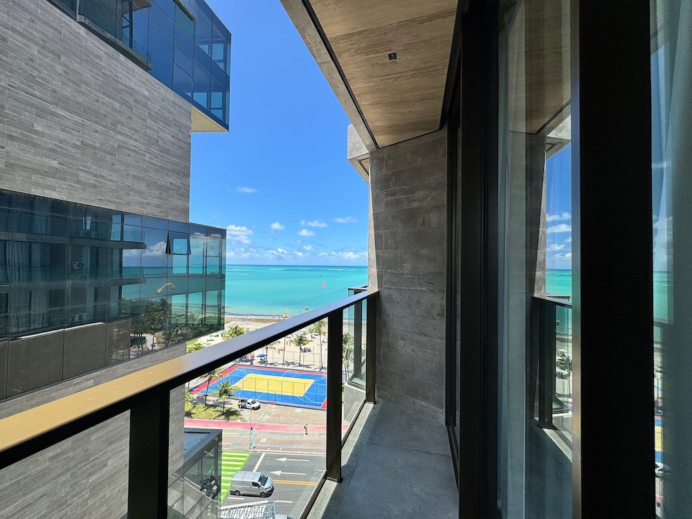 NWTs - Estúdios com Vista Lateral Mar