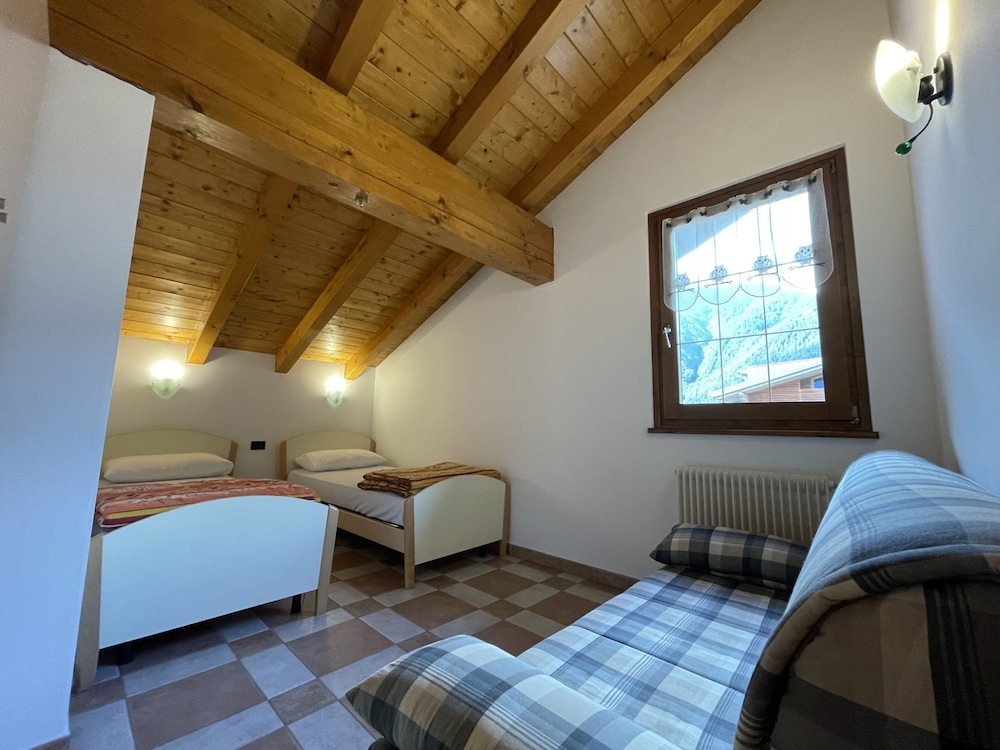 032 Luminosa Mansarda Pinzolo