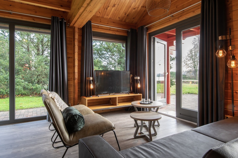 Restyled Wooden Lodge Near the Maasduinen