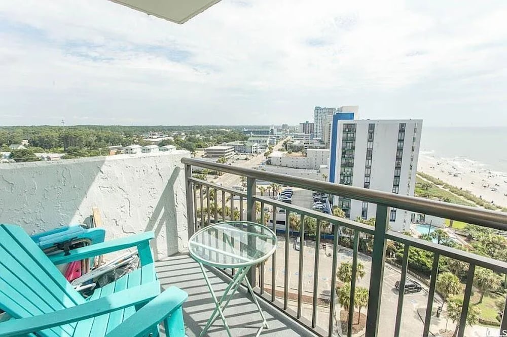 Beachfront Haven 1BR Condo with Balcony
