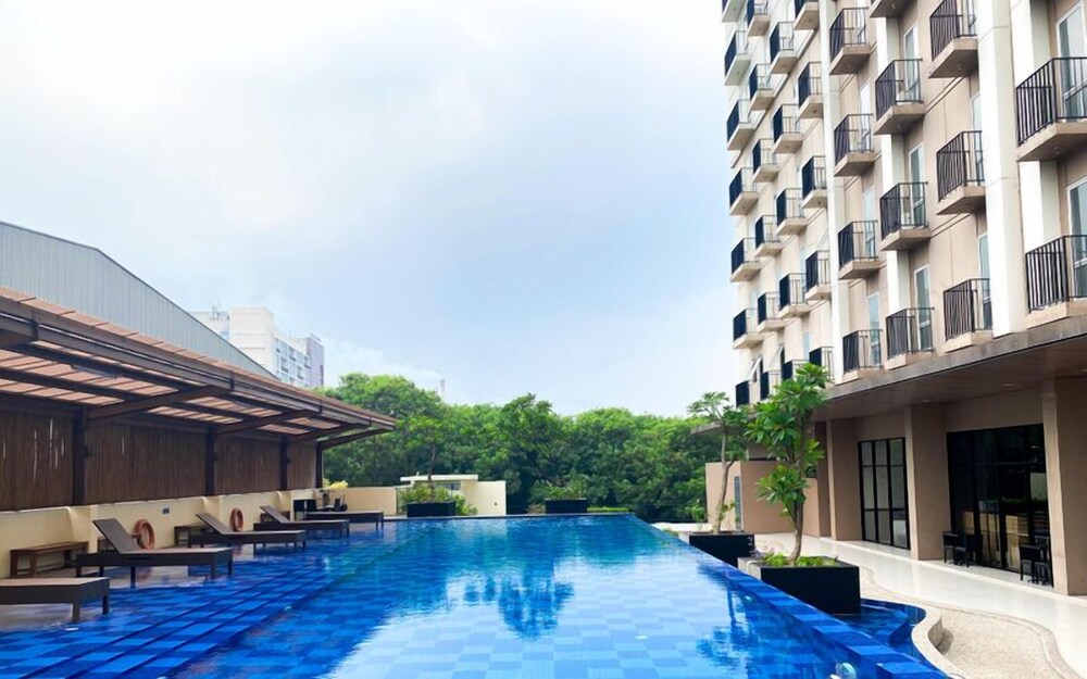 Simple 2Br At Azalea Suites Apartment