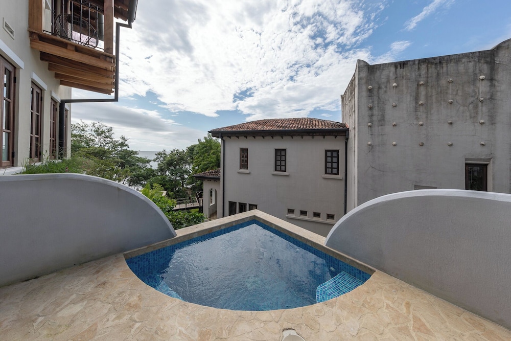 Mediterranean-Style Villa with a Private Plunge Pool, Ocean Views, and Exclusive Beach Club Access
