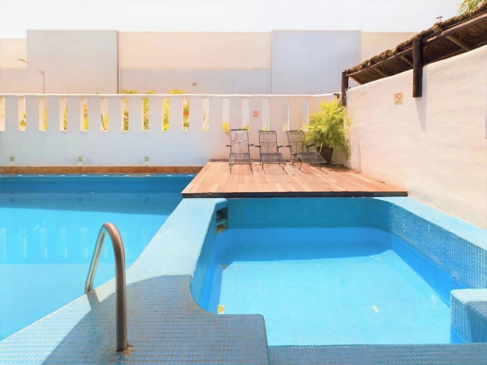 Stylish 2BR Retreat With Private Patio