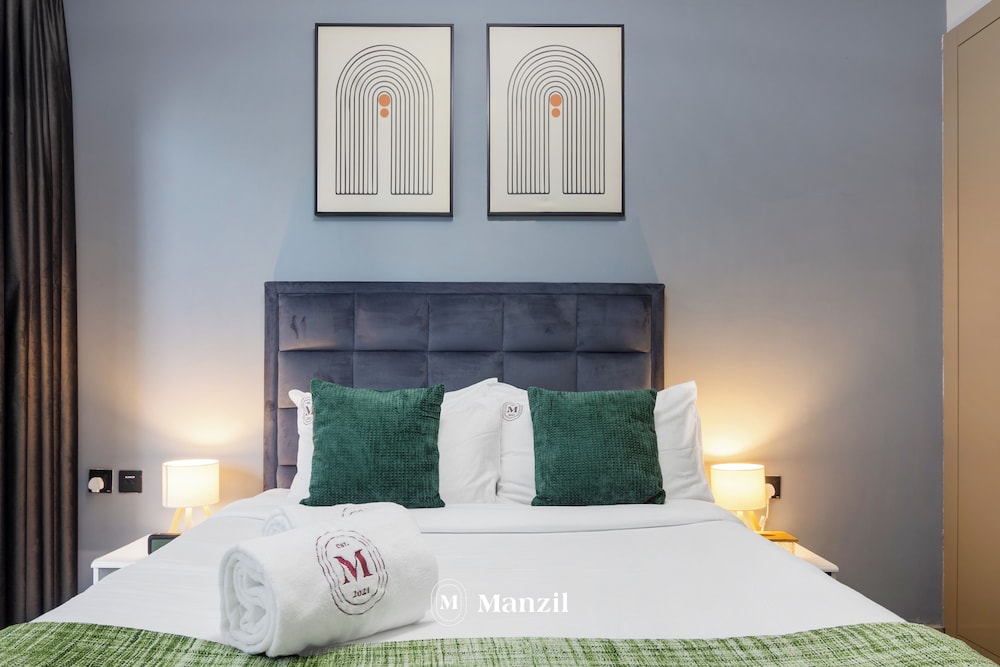 Manzil-Stylish 1BR with Maid room in JVC