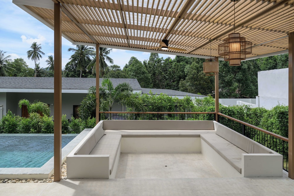 Tropical Poolside Retreat by Sea N' Rent