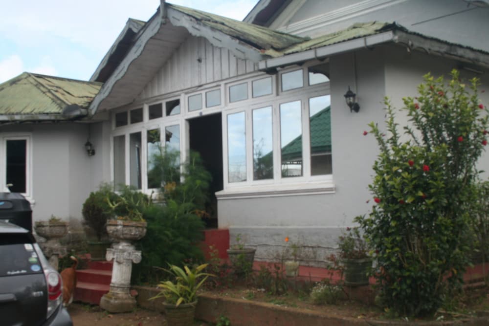 Old English Colonial Bungalow